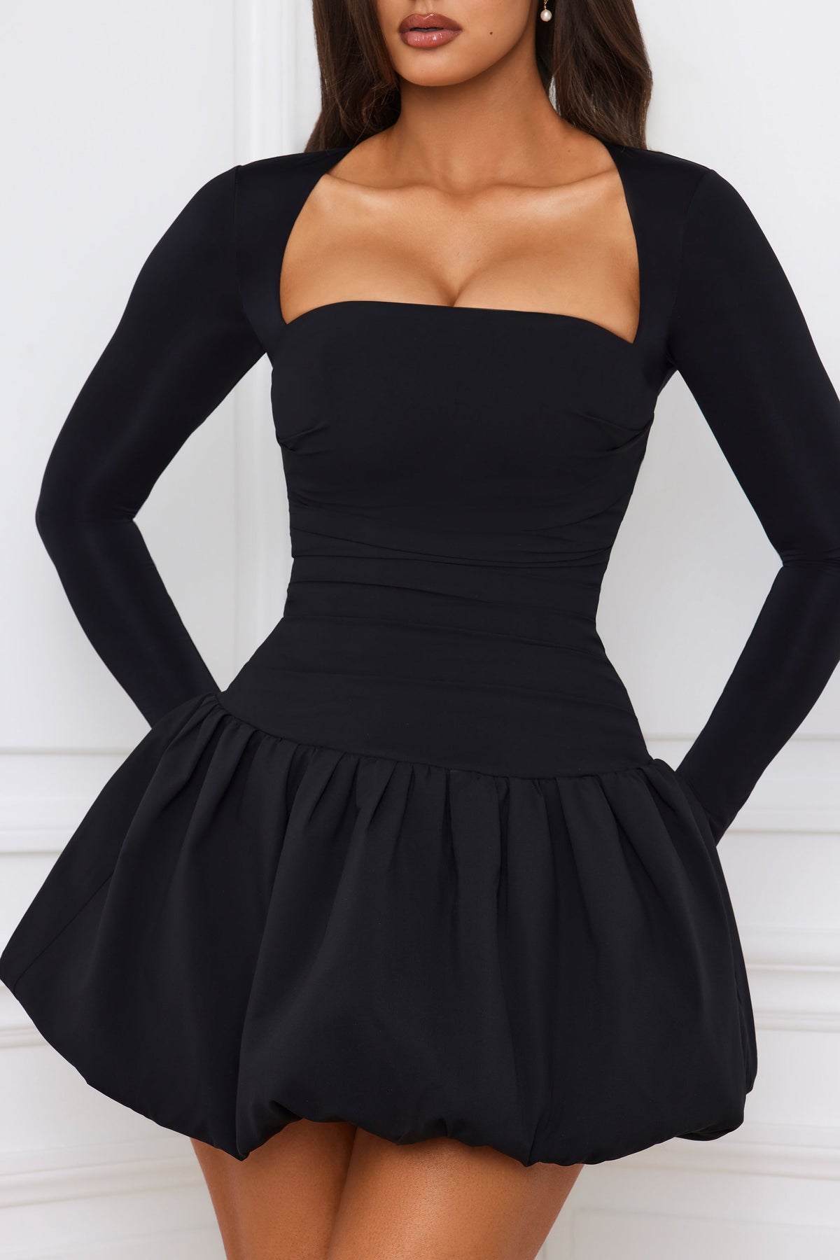 Chic Long-Sleeve Bubble Hem Mini Dress in Black
