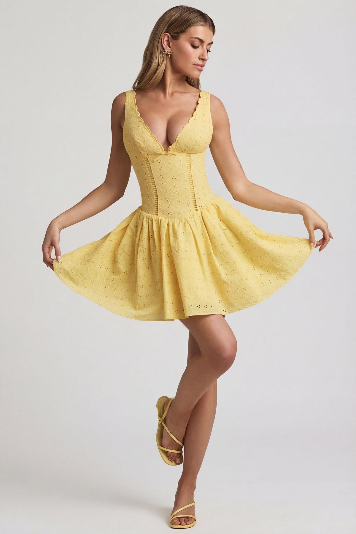 Chic Broderie Anglaise Bow-Detail A-Line Mini Dress in Pastel Yellow