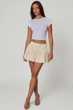 Chic Bow-Detail Broderie Anglaise Mini Skirt in Ivory