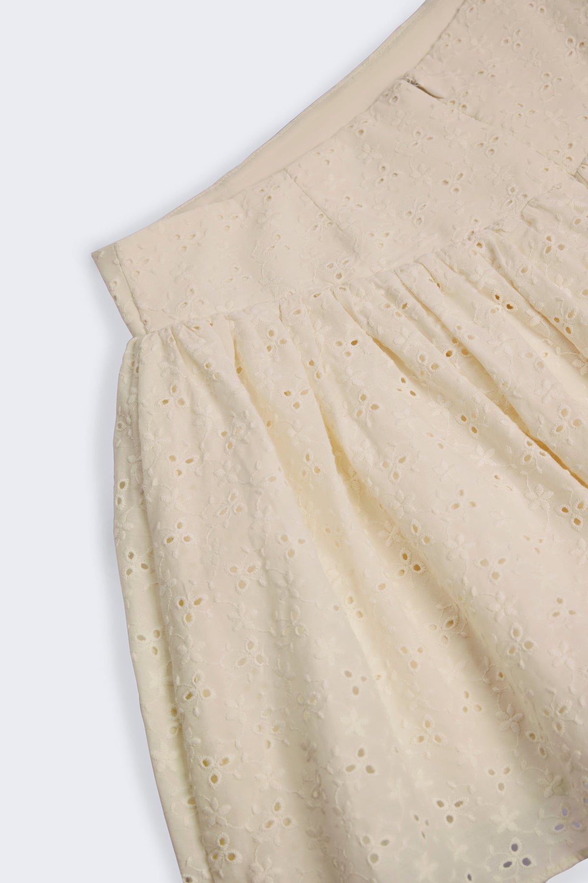 Chic Bow-Detail Broderie Anglaise Mini Skirt in Ivory