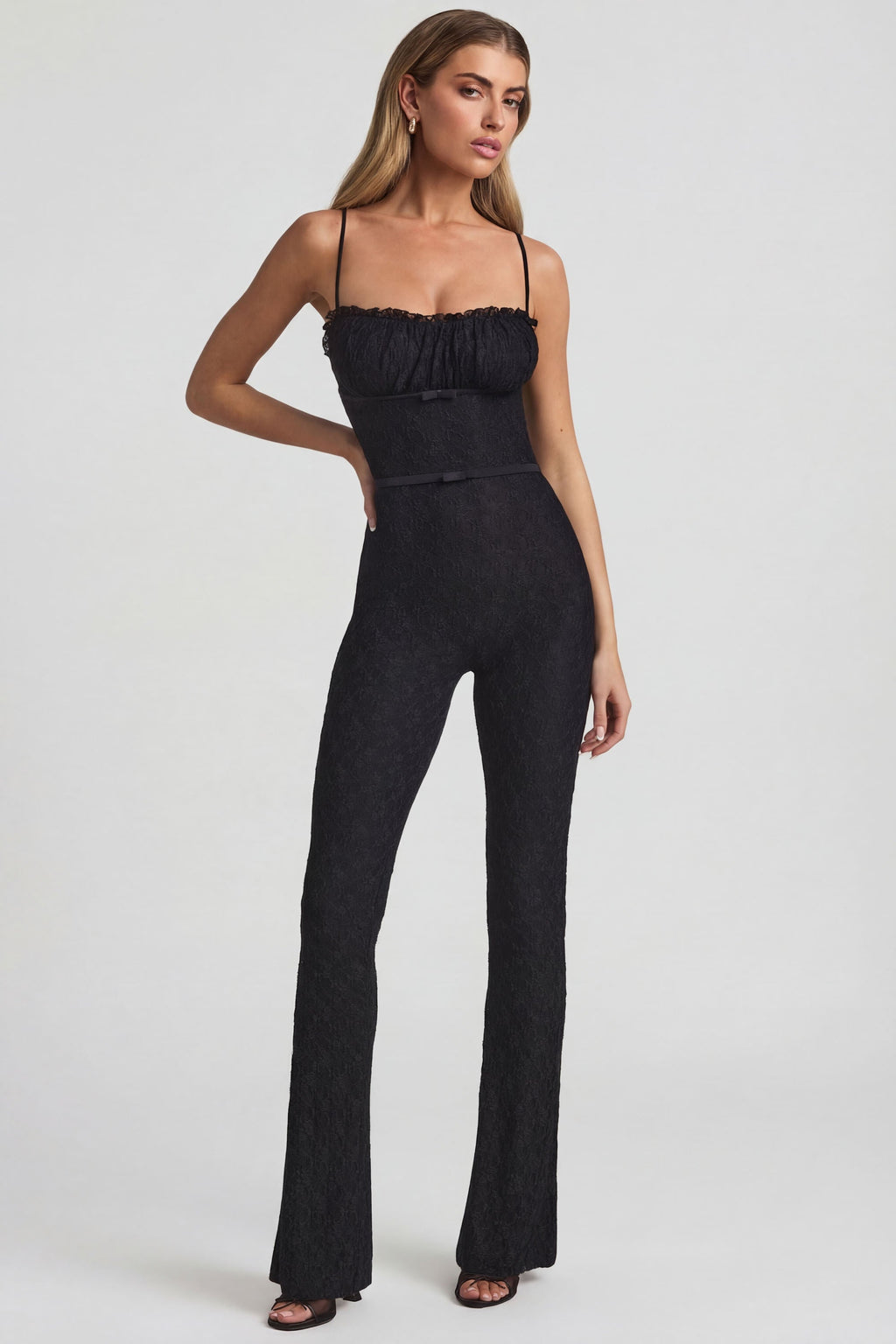 Chic Bow-Detail Lace Flared Jumpsuit in Black