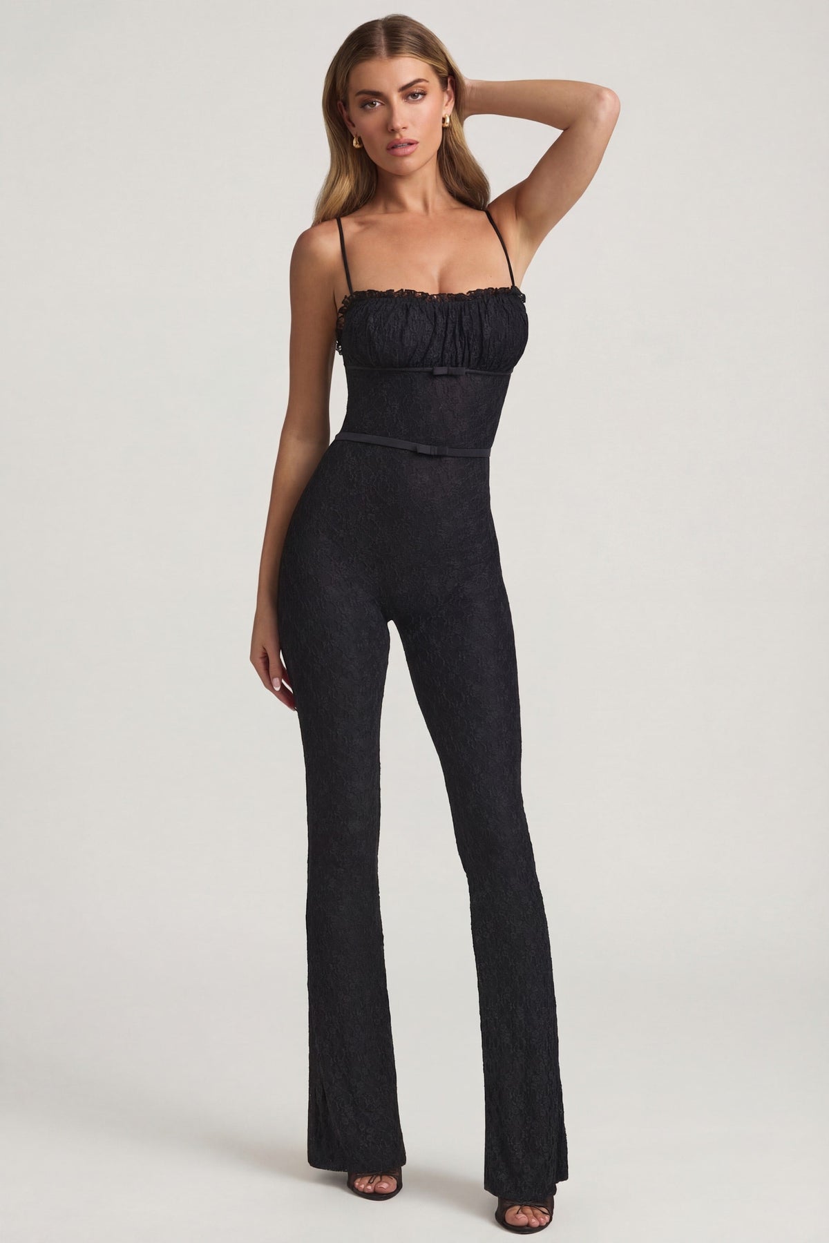 Chic Bow-Detail Lace Flared Jumpsuit in Black