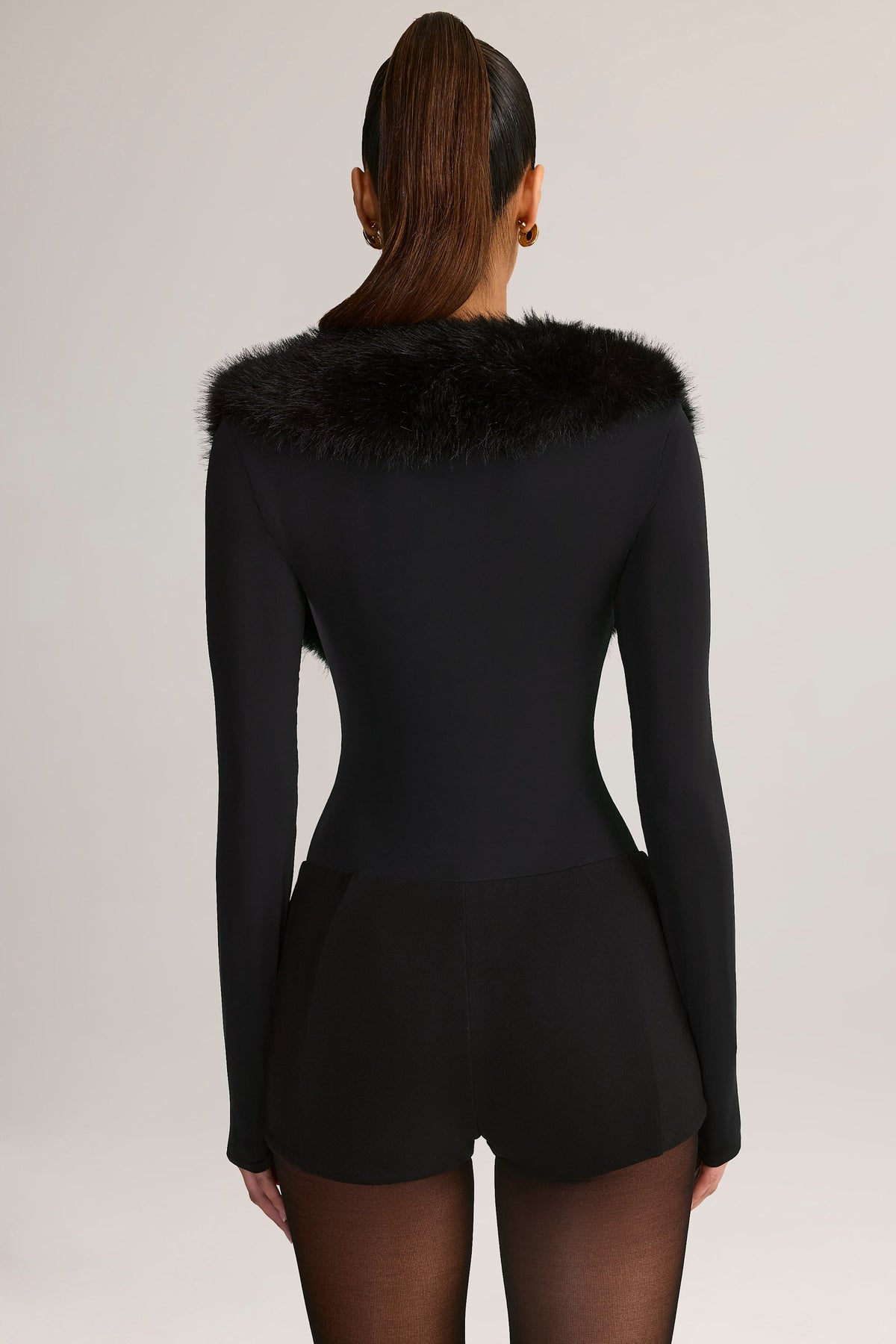 Chic Faux Fur-Trim Corset Playsuit in Black