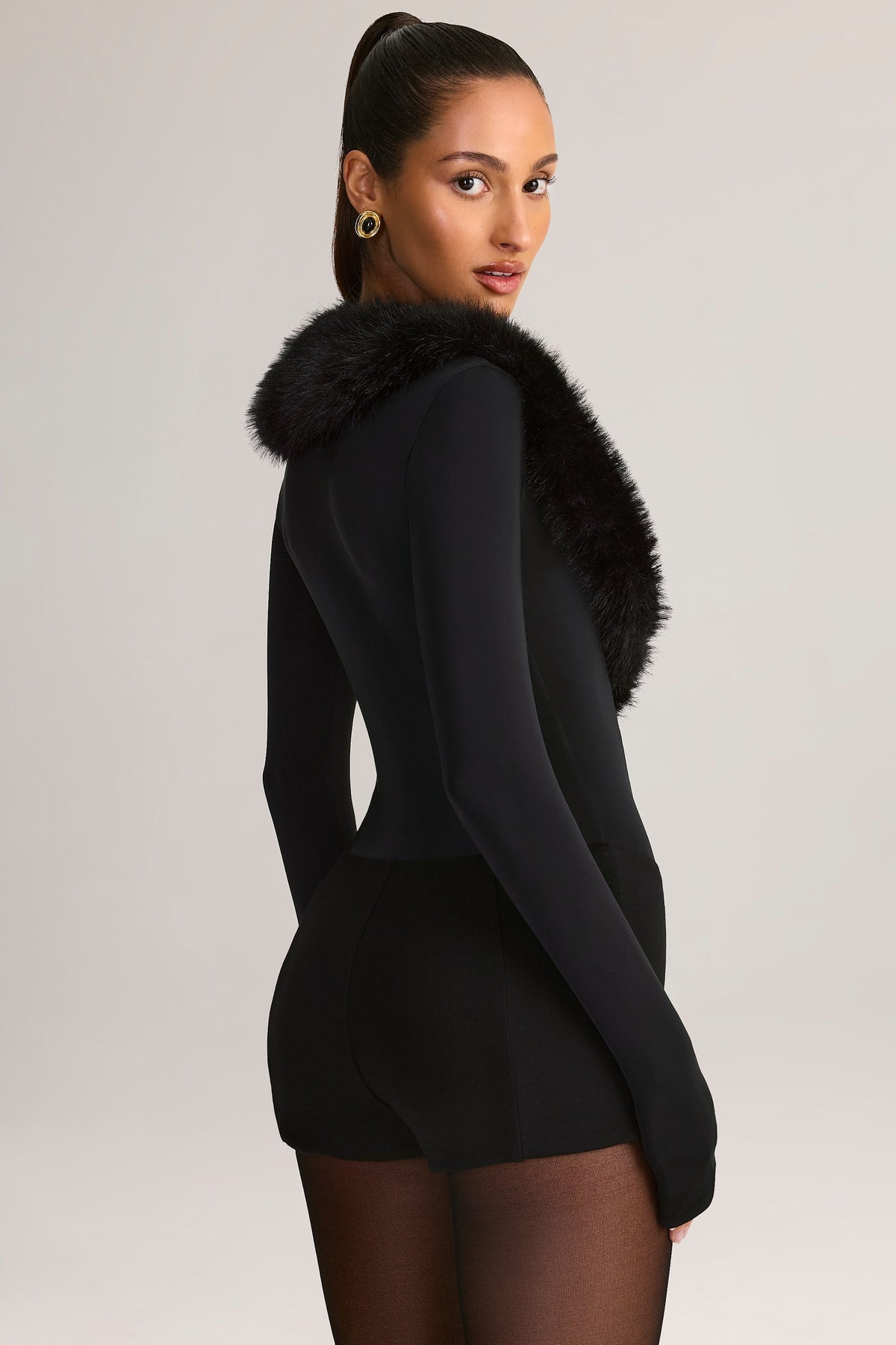 Chic Faux Fur-Trim Corset Playsuit in Black