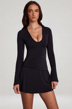 Chic Soft Jersey Scoop-Neck Flared Mini Dress in Black