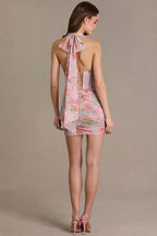 Chic Embellished Draped Mini Dress in Pink Floral Print