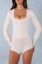 Chic Knit Long-Sleeve Romper in Ivory