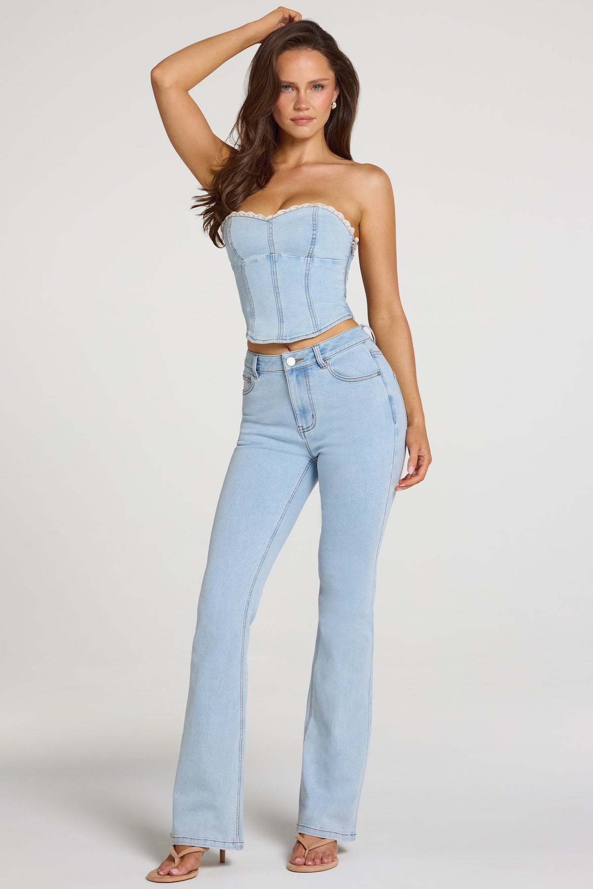 Chic Mid-Rise Bootcut Jeans in Light Denim