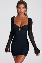Chic Embellished Long Sleeve Mini Dress in Black