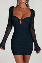 Chic Embellished Long Sleeve Mini Dress in Black