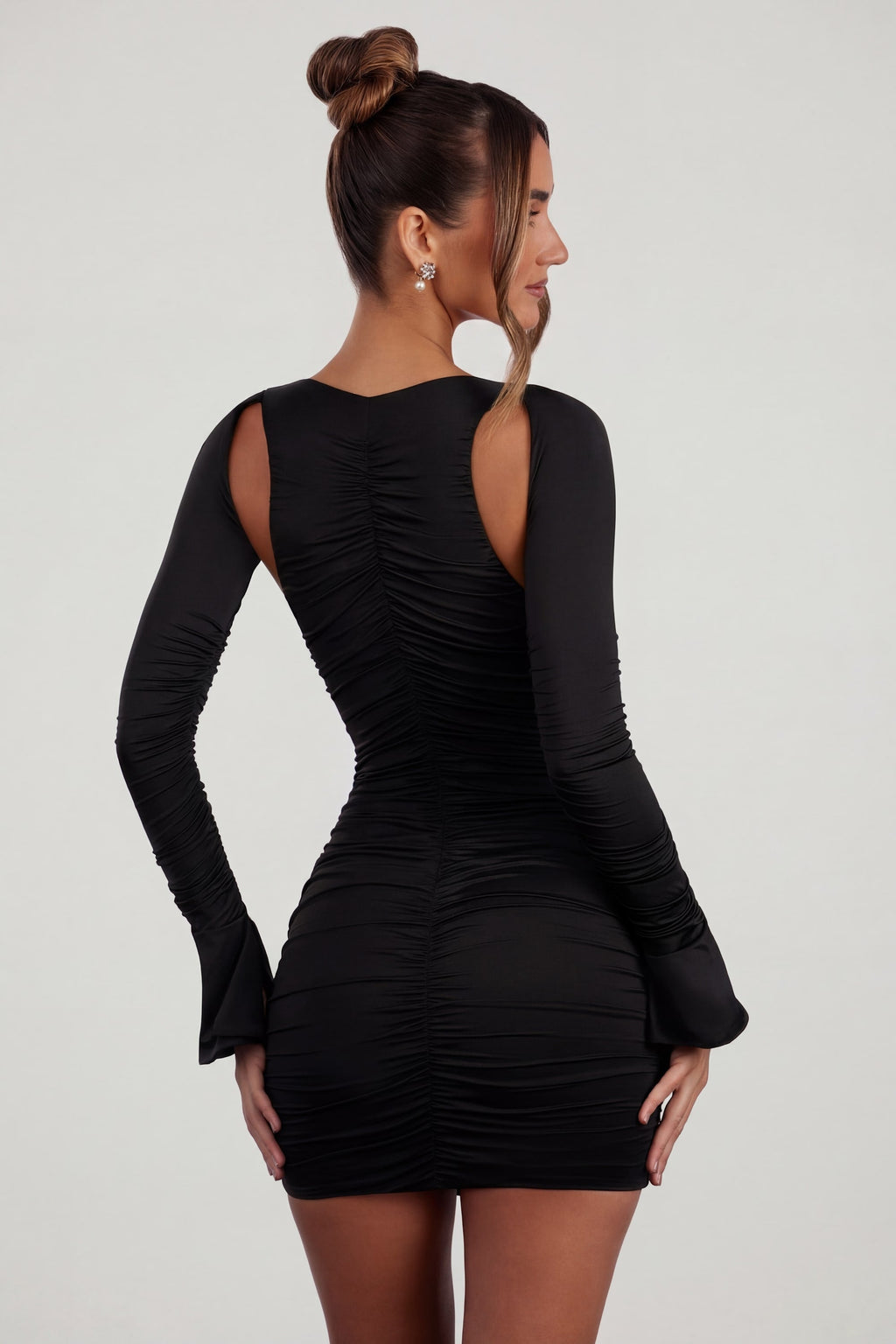 Chic Low Plunge Ruched Mini Dress in Black