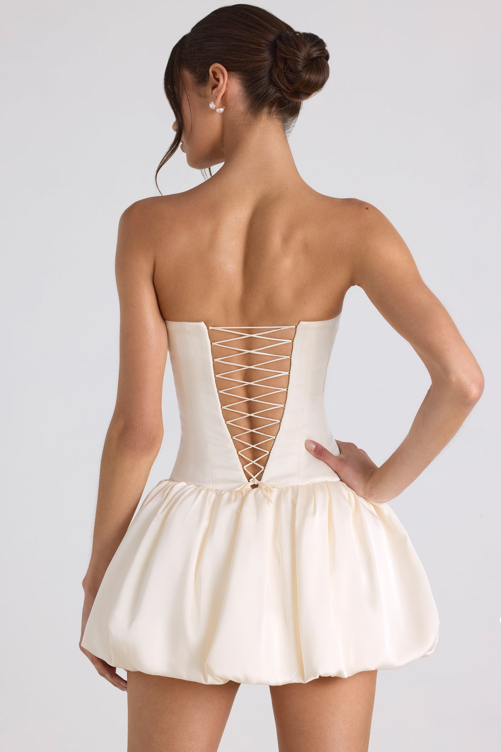 Chic Lace-Up Bubble Hem Corset Mini Dress in Ivory