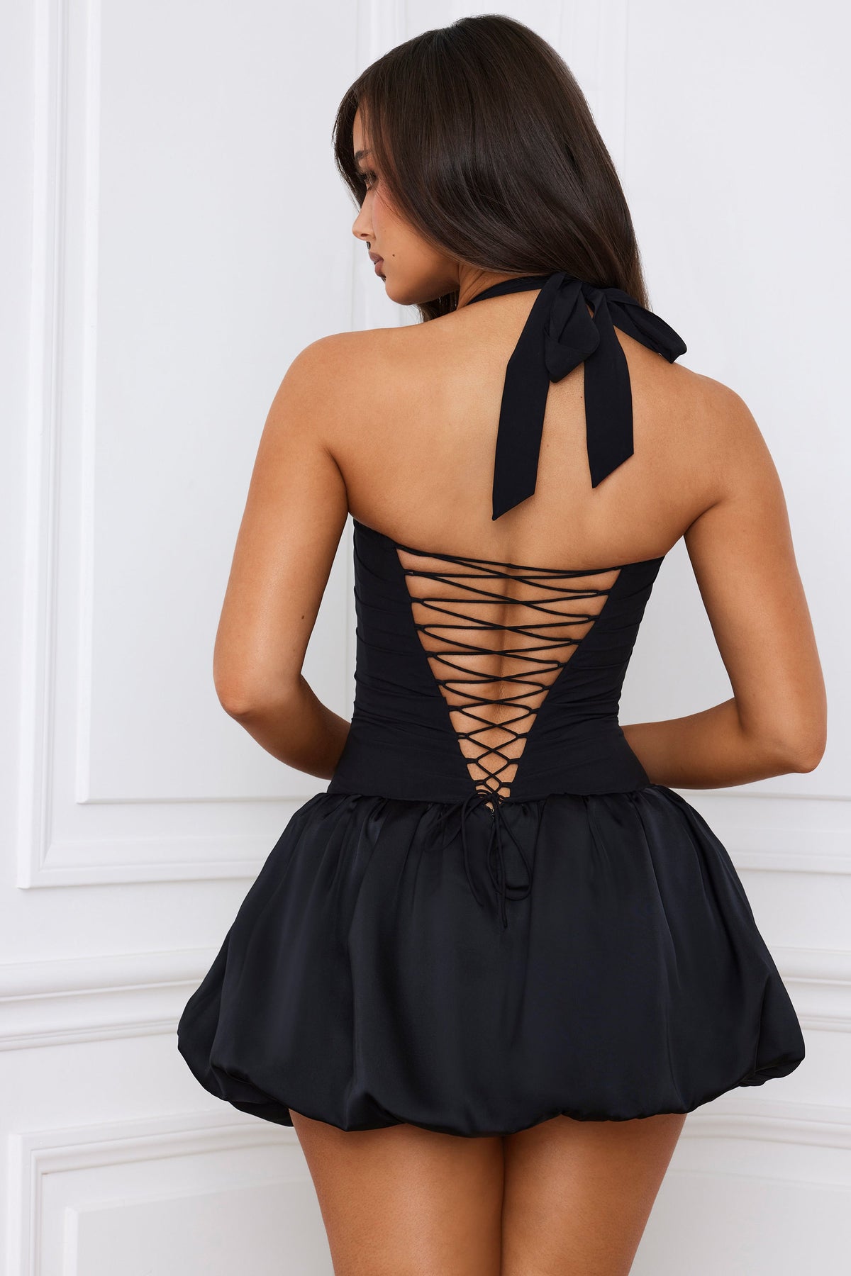 Chic Halterneck Lace-Up Bubble Hem Corset Micro Mini Dress in Black