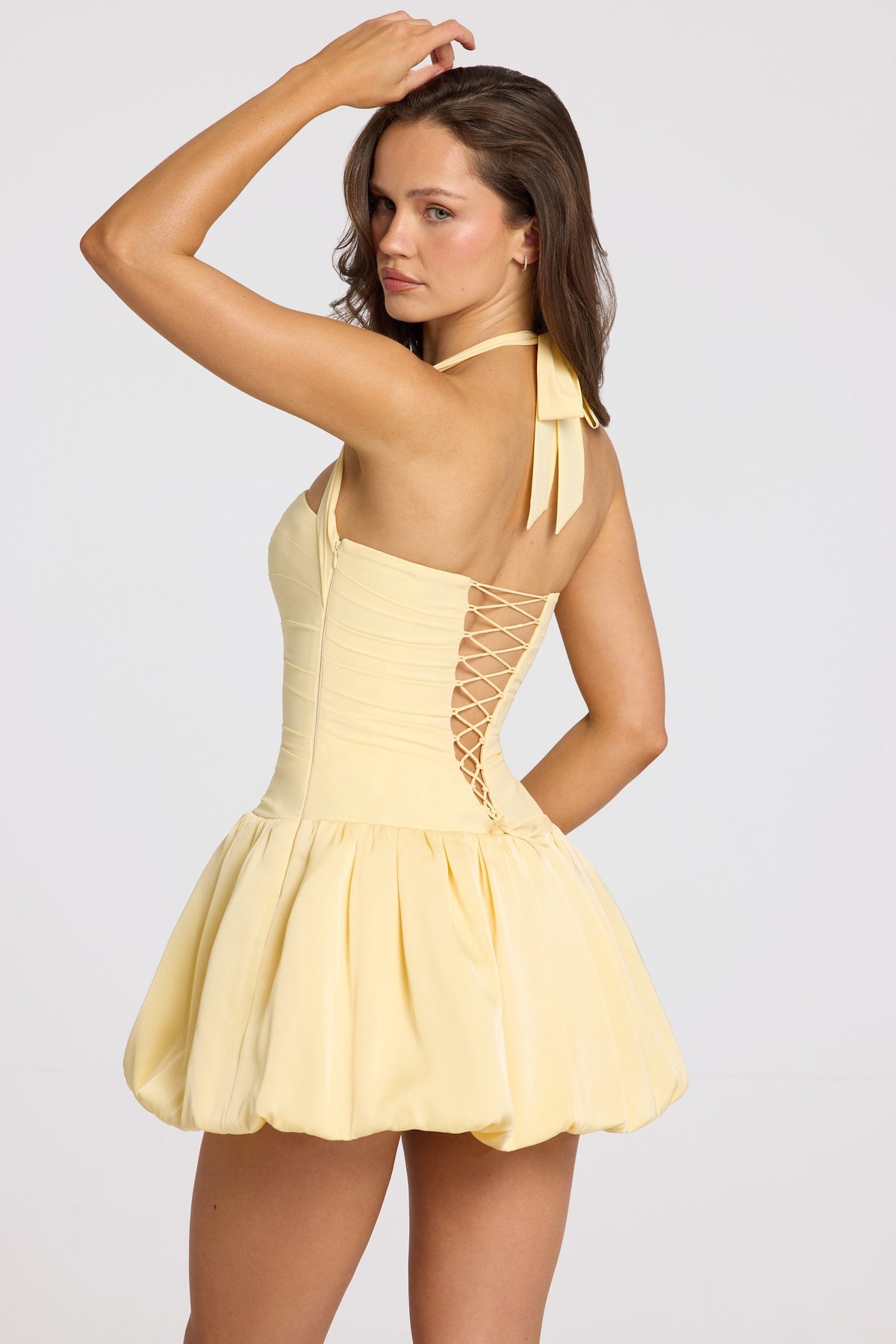 Chic Halterneck Lace-Up Bubble Hem Corset Micro Mini Dress in Butter Yellow