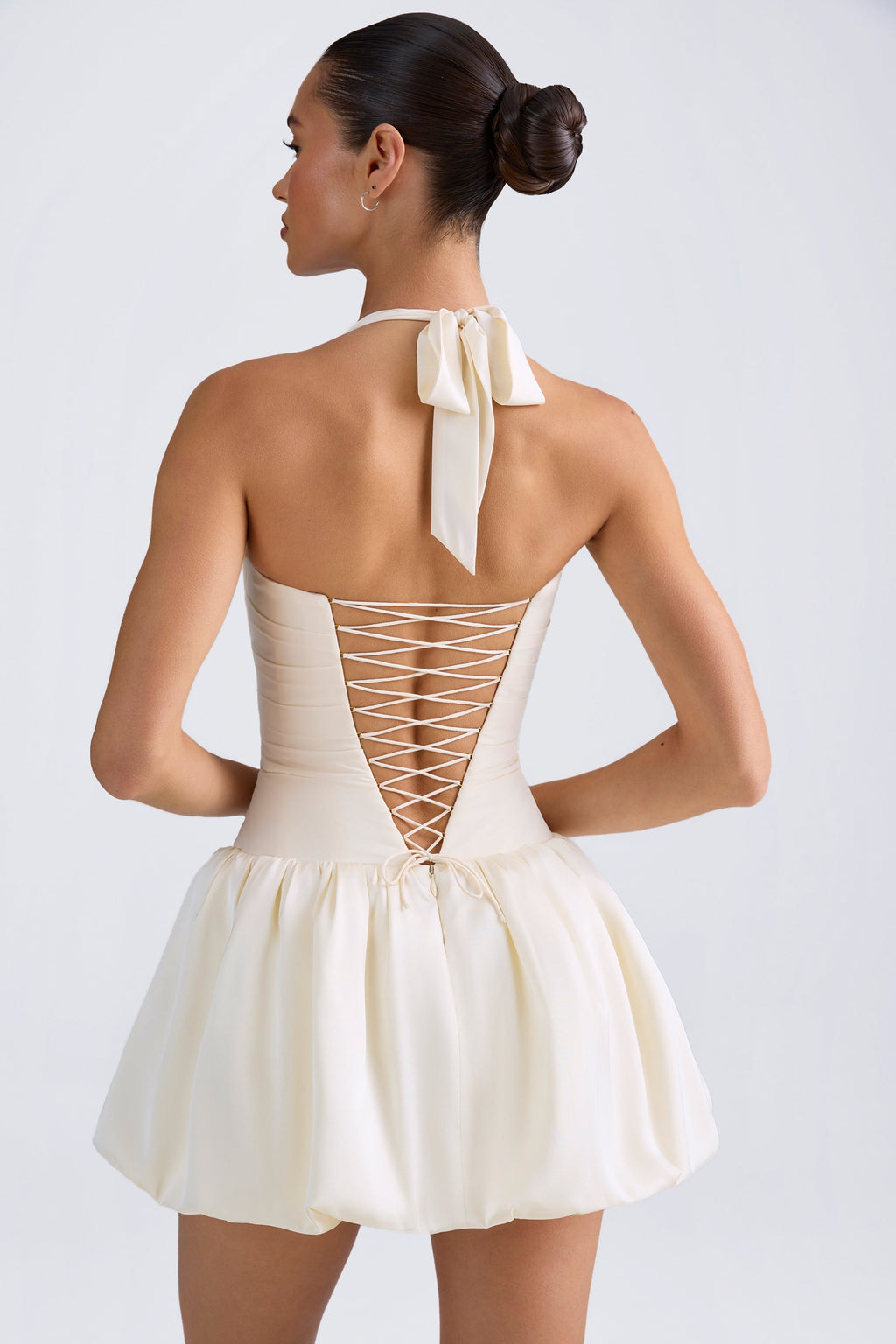 Chic Halterneck Lace-Up Bubble Hem Corset Micro Mini Dress in Ivory