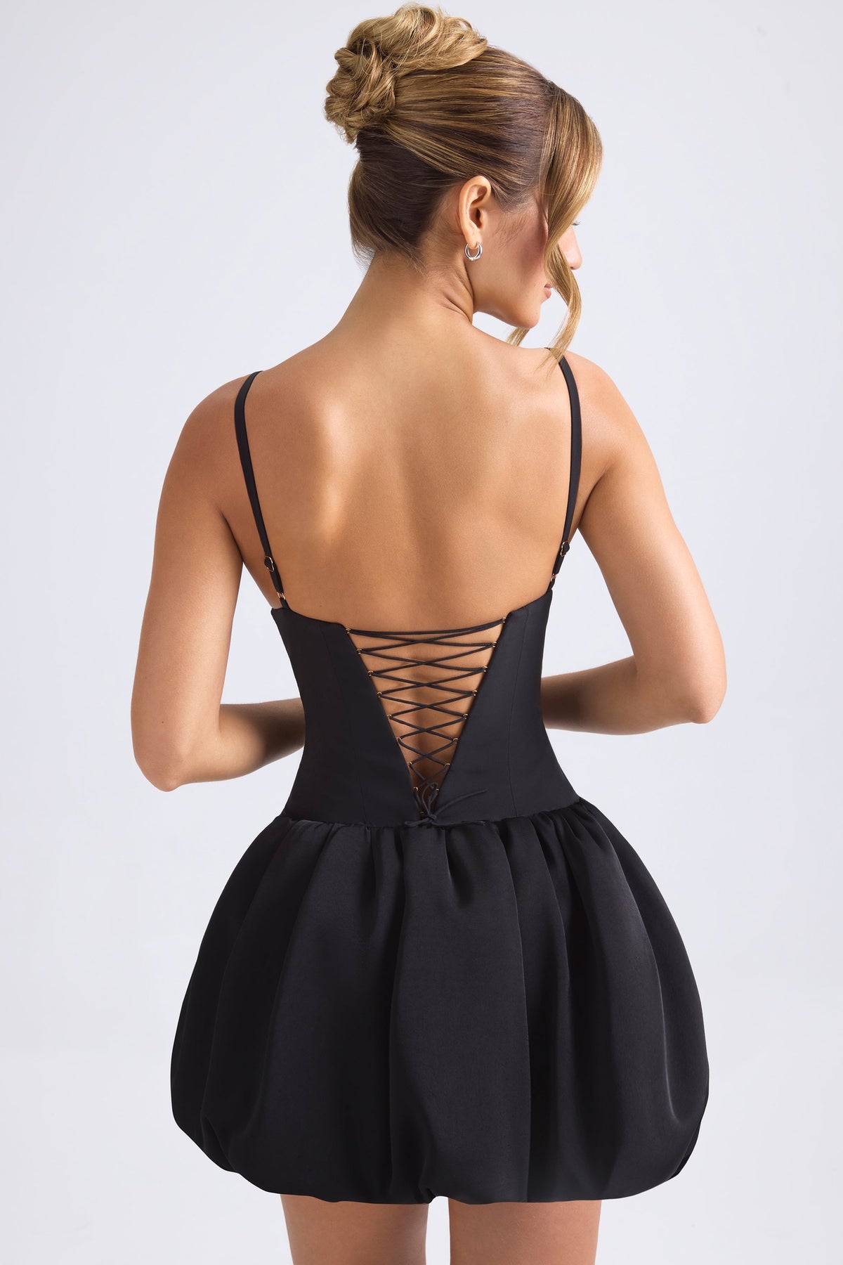 Chic Lace-Up Bubble Hem Corset Micro Mini Dress in Black