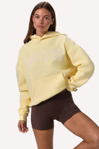 Chic Embroidered Oversized Hoodie in Soft Yellow