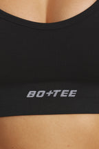 Chic Plunge Neck Define Luxe Sports Bra in Black