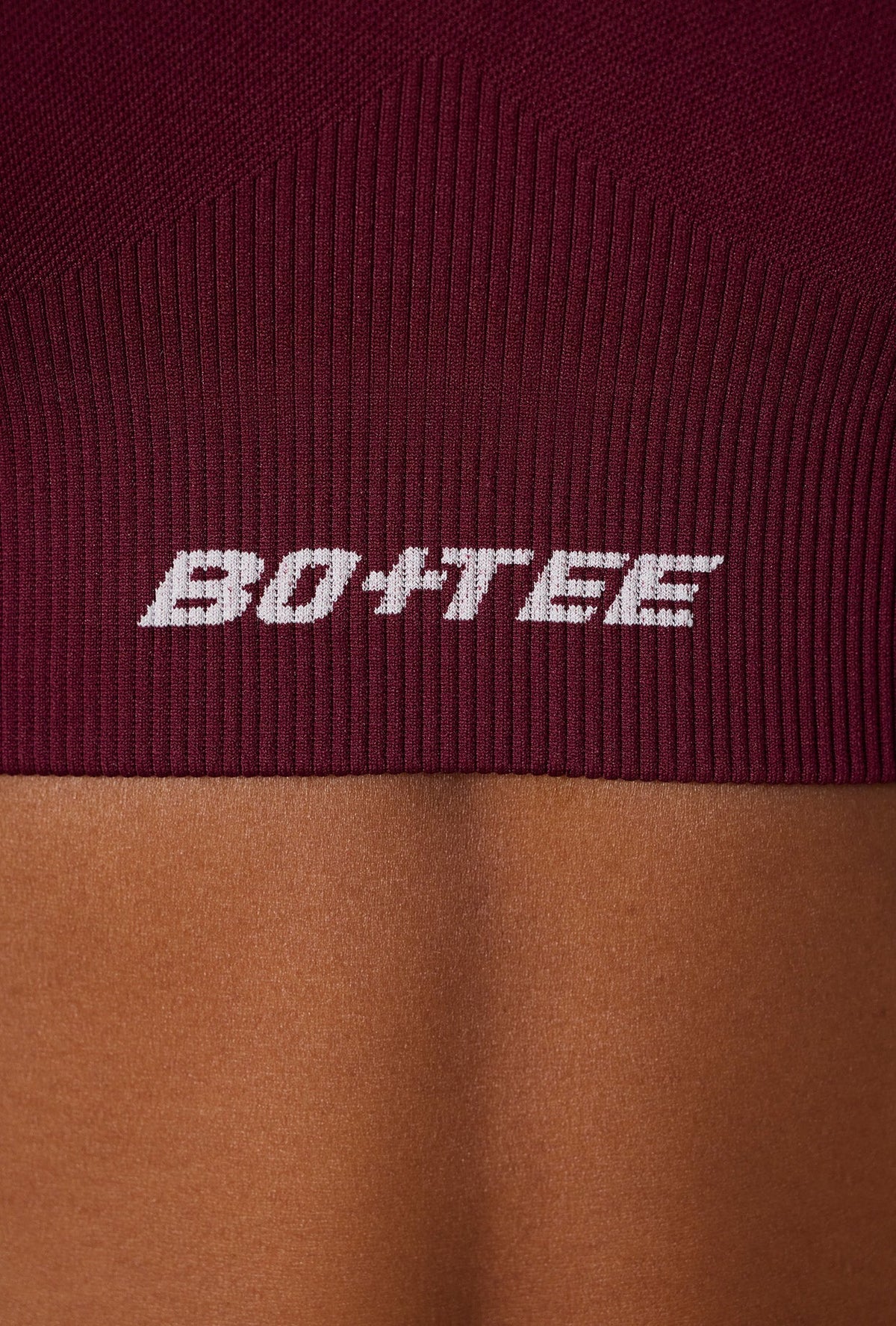 Chic Super Sculpt Seamless Cross Back Sports Bra in Plum