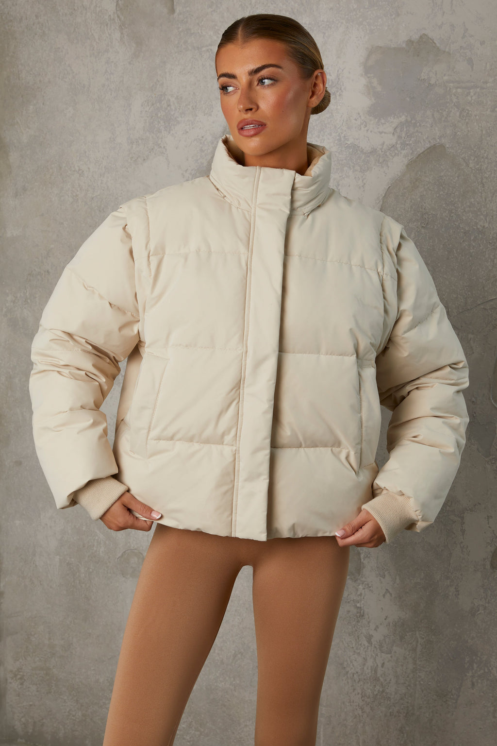 Chic Cropped Puffer Jacket with Detachable Sleeves in Sand