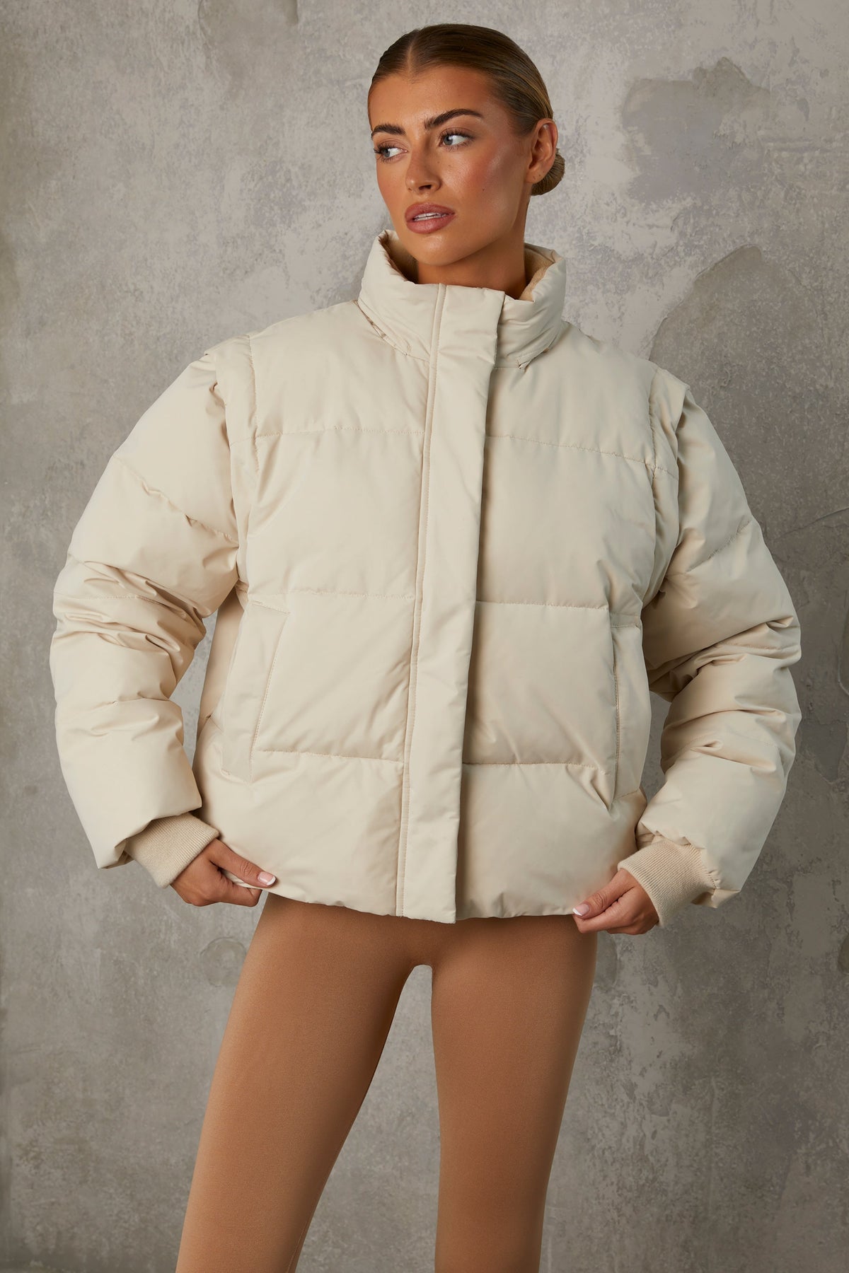 Chic Cropped Puffer Jacket with Detachable Sleeves in Sand