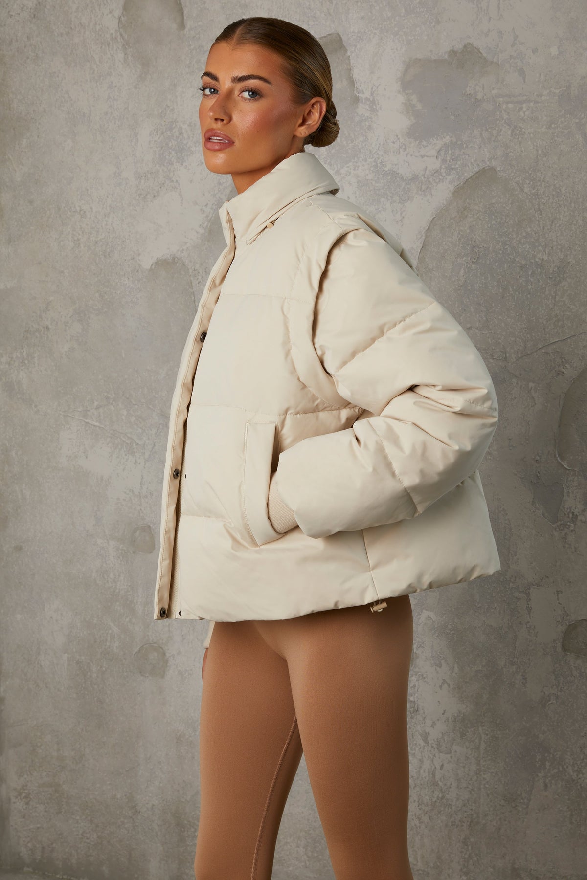 Chic Cropped Puffer Jacket with Detachable Sleeves in Sand