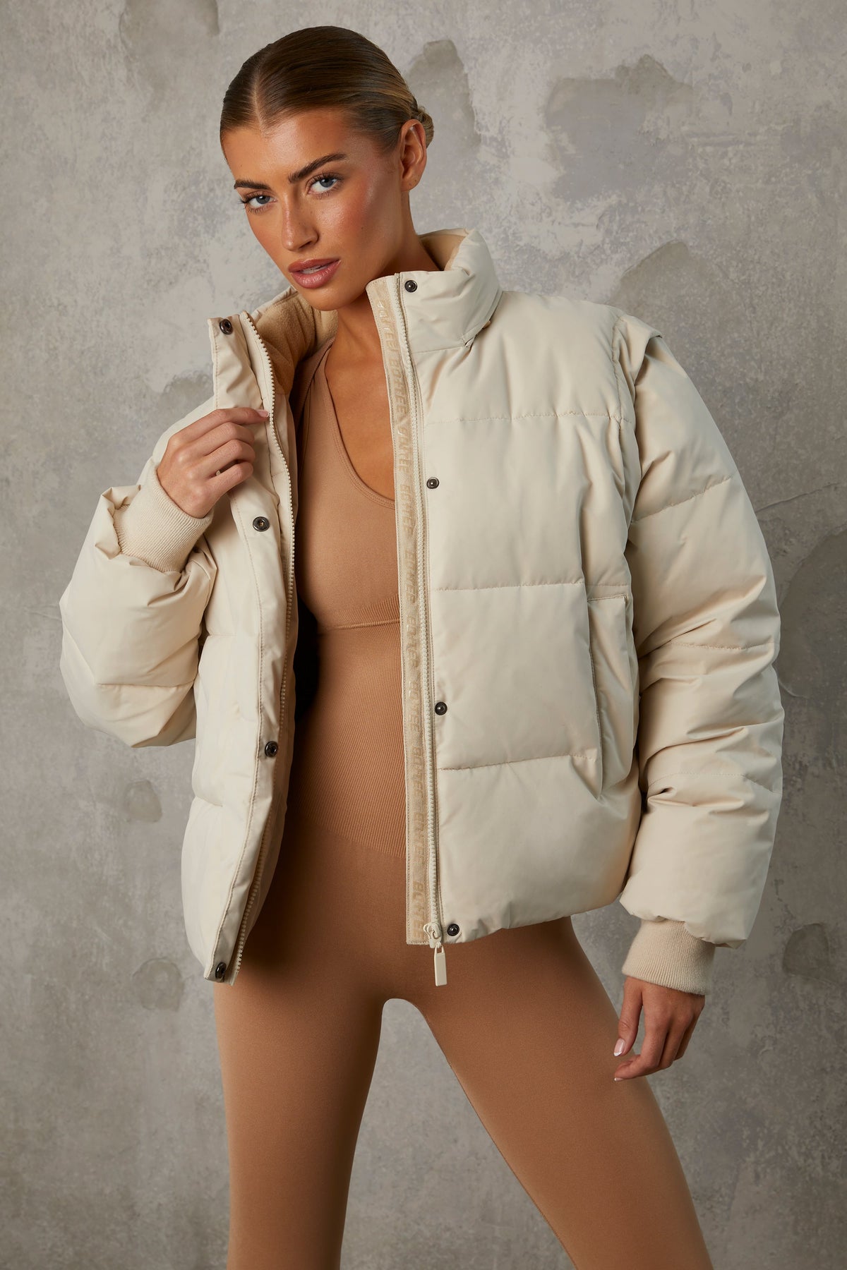 Chic Cropped Puffer Jacket with Detachable Sleeves in Sand