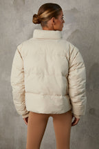 Chic Cropped Puffer Jacket with Detachable Sleeves in Sand