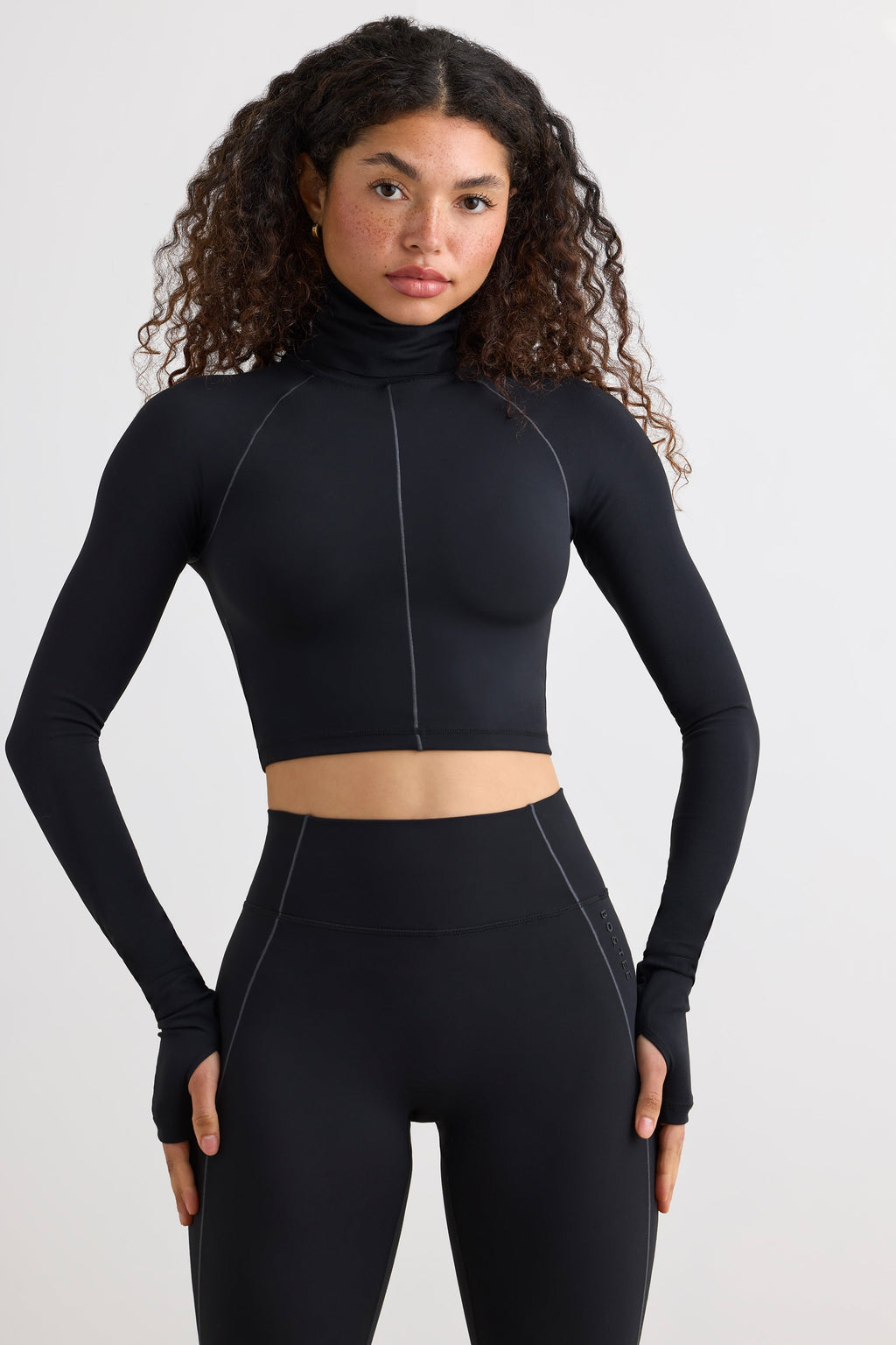 Chic Soft Active Turtleneck Crop Top in Black