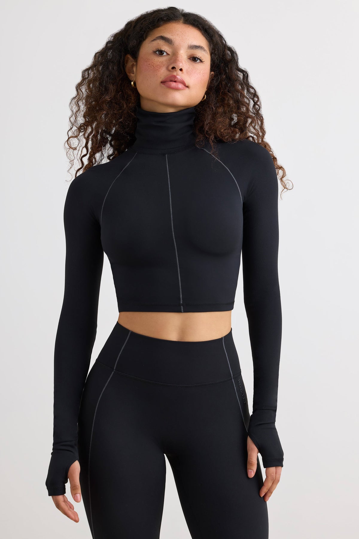 Chic Soft Active Turtleneck Crop Top in Black