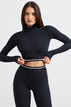 Chic Backless Turtleneck Long-Sleeve Crop Top in Black