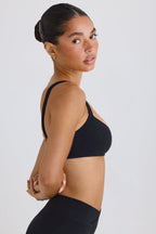 Chic Soft Active Contrast-Trim Sports Bra in Black