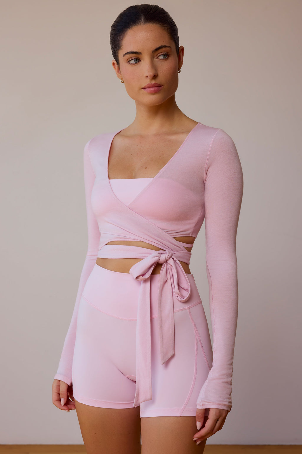 Chic Long-Sleeve Wrap Crop Top in Soft Pink