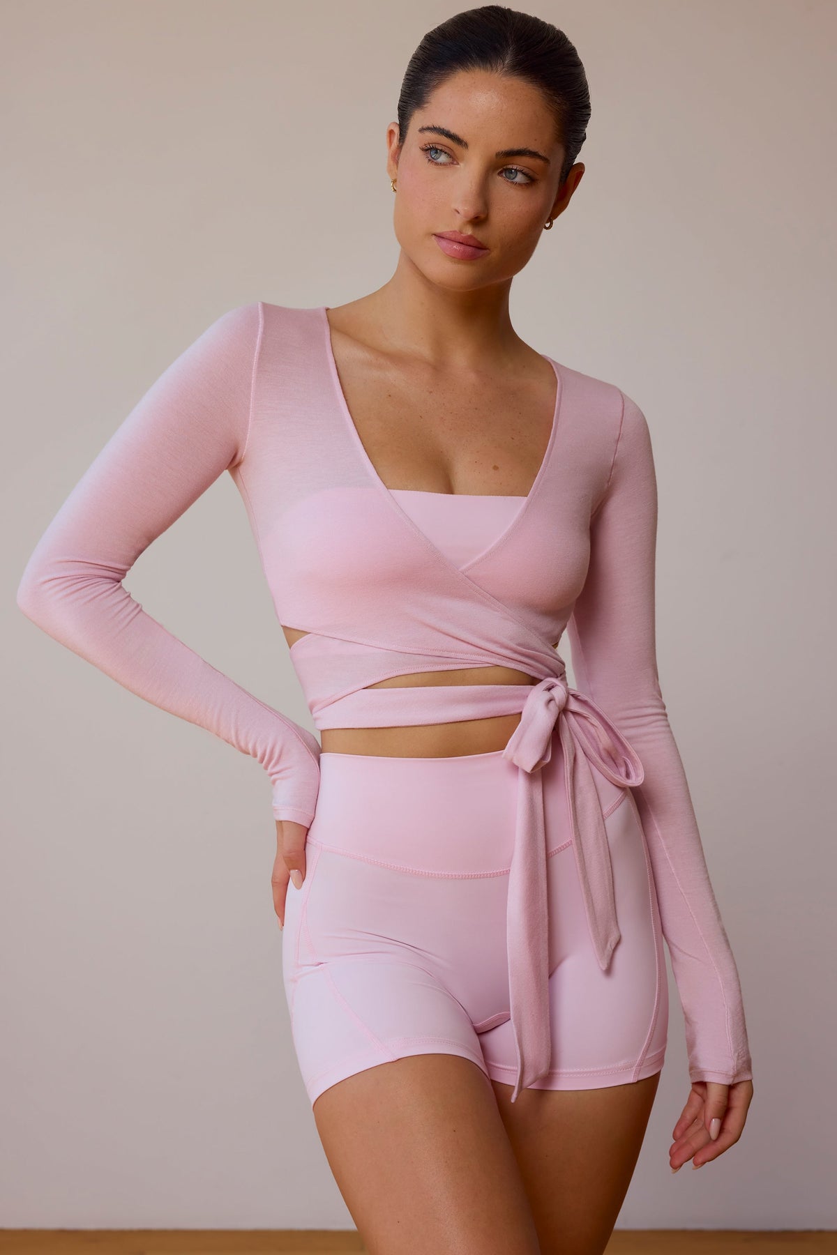 Chic Long-Sleeve Wrap Crop Top in Soft Pink