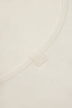 Chic Cross-Back Tank Top in Cream