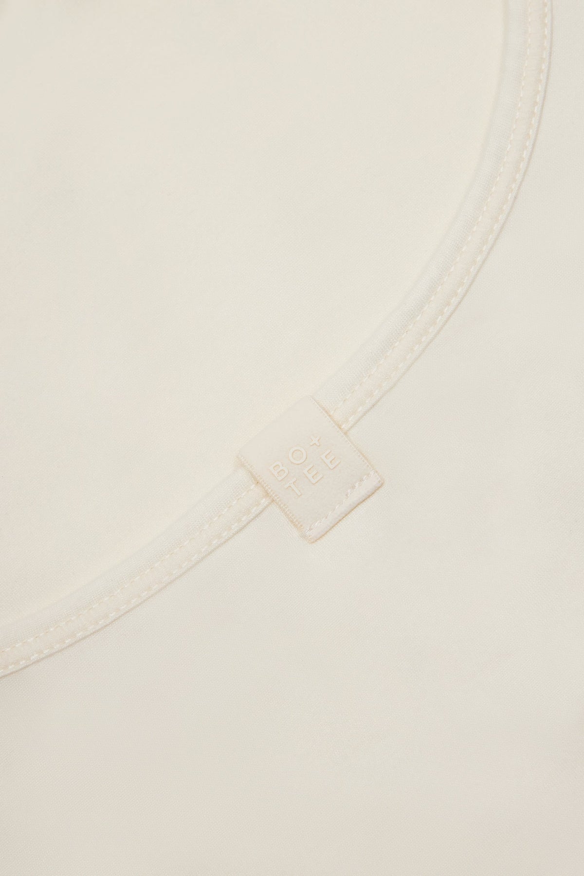 Chic Cross-Back Tank Top in Cream