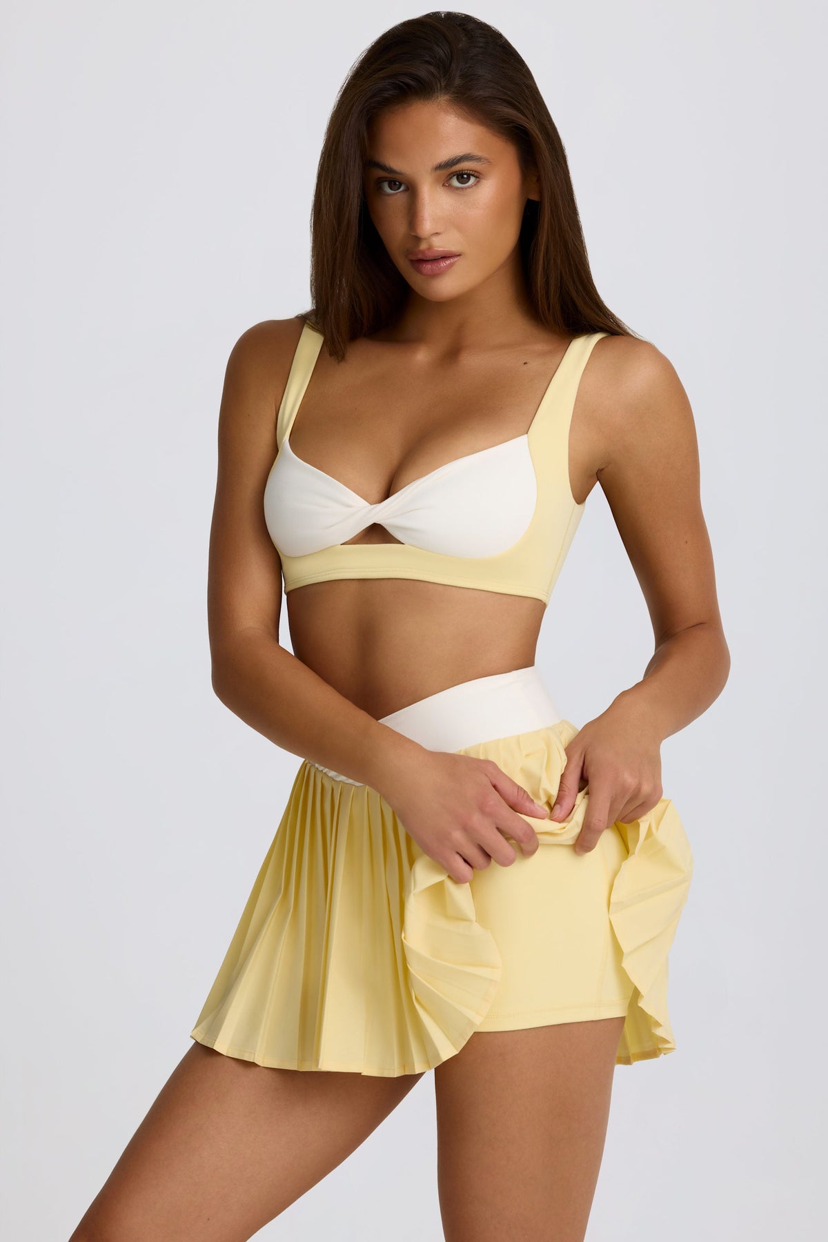 Chic Soft Active Crossover Pleated Mini Skort in Lemon