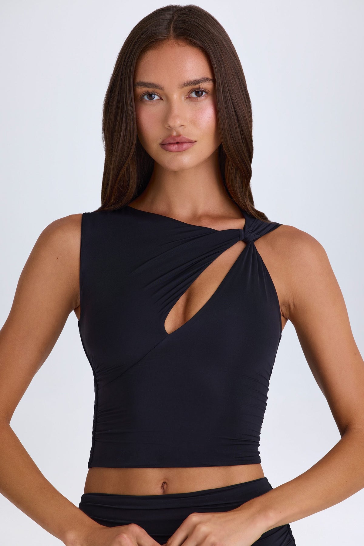 Chic Twisted Cut-Out Tank Top in Black