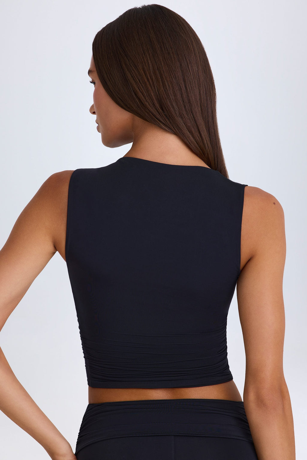 Chic Twisted Cut-Out Tank Top in Black
