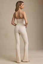 Chic Bow-Detail Lace Flared Jumpsuit in Ivory
