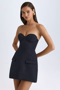 Chic Strapless Structured Tulip Mini Dress in Black