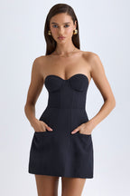 Chic Strapless Structured Tulip Mini Dress in Black