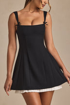 Chic Bow-Detail Pleated A-Line Mini Dress in Black