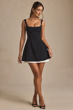 Chic Bow-Detail Pleated A-Line Mini Dress in Black
