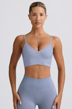 Chic Define Luxe V-Neck Sports Bra in Blue Grey