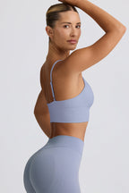 Chic Define Luxe V-Neck Sports Bra in Blue Grey