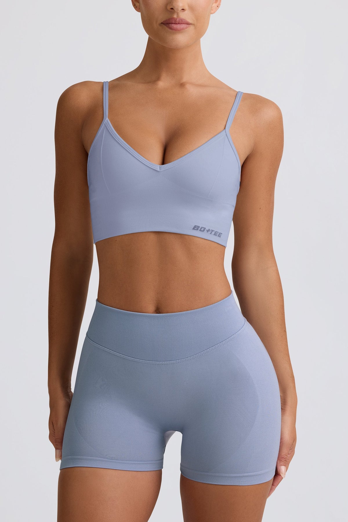 Chic Define Luxe V-Neck Sports Bra in Blue Grey