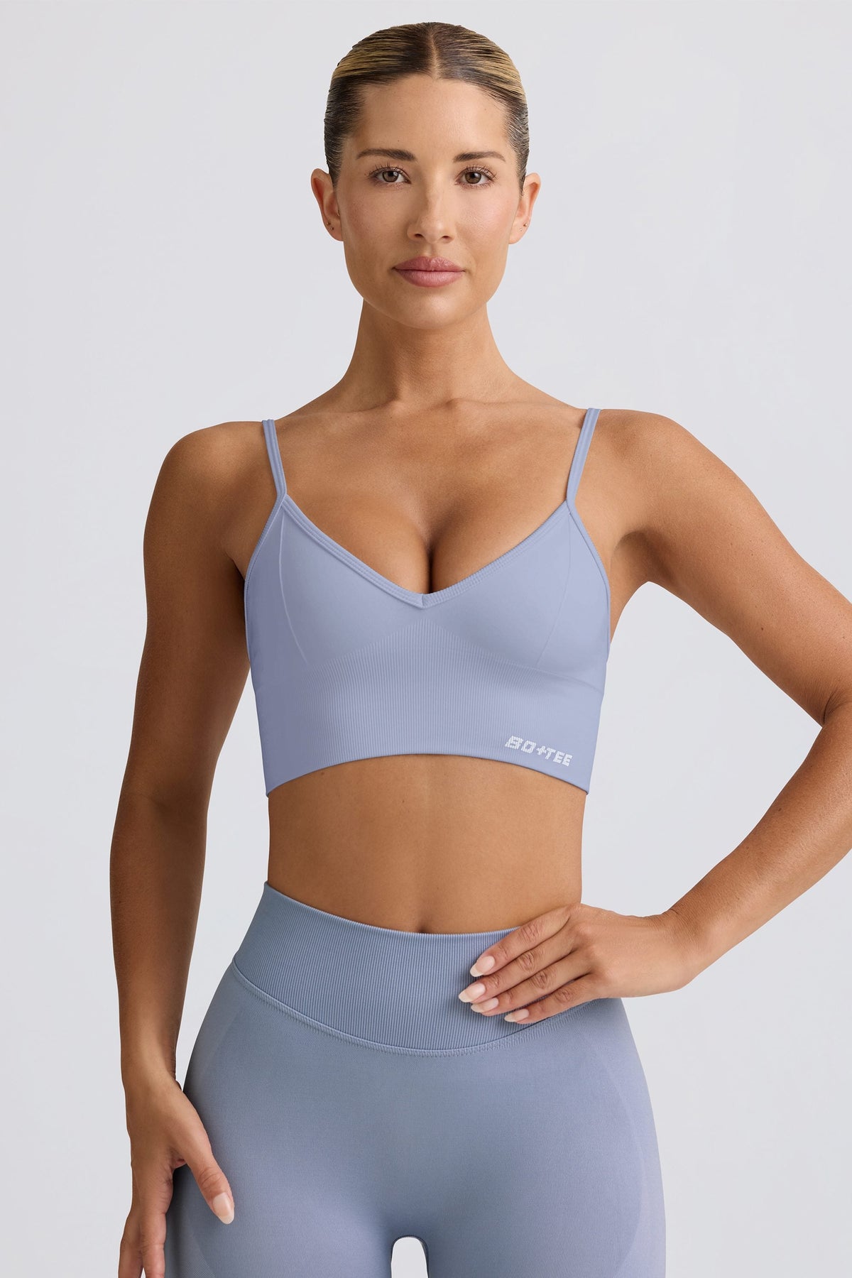 Chic Define Luxe V-Neck Sports Bra in Blue Grey