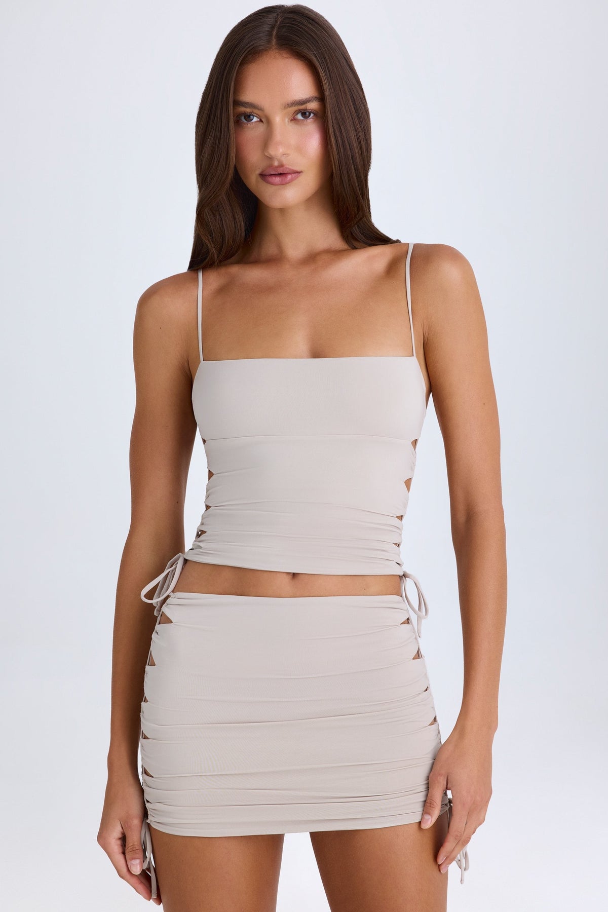 Chic Ruched Cut-Out Mini Skirt in Taupe