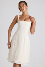 Chic Bow-Detail Pleated A-Line Midi Dress in Ivory